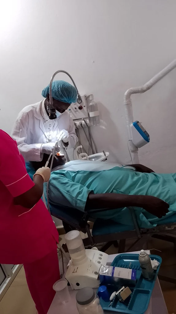 Dentist treating patient