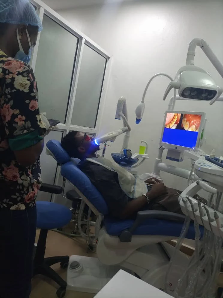 Patient receiving laser dental treatment